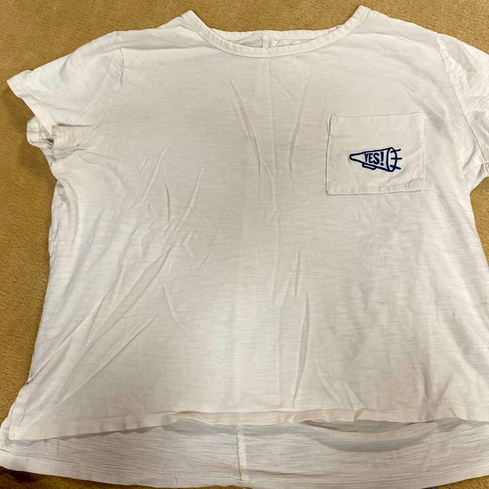 White “yes” shirt